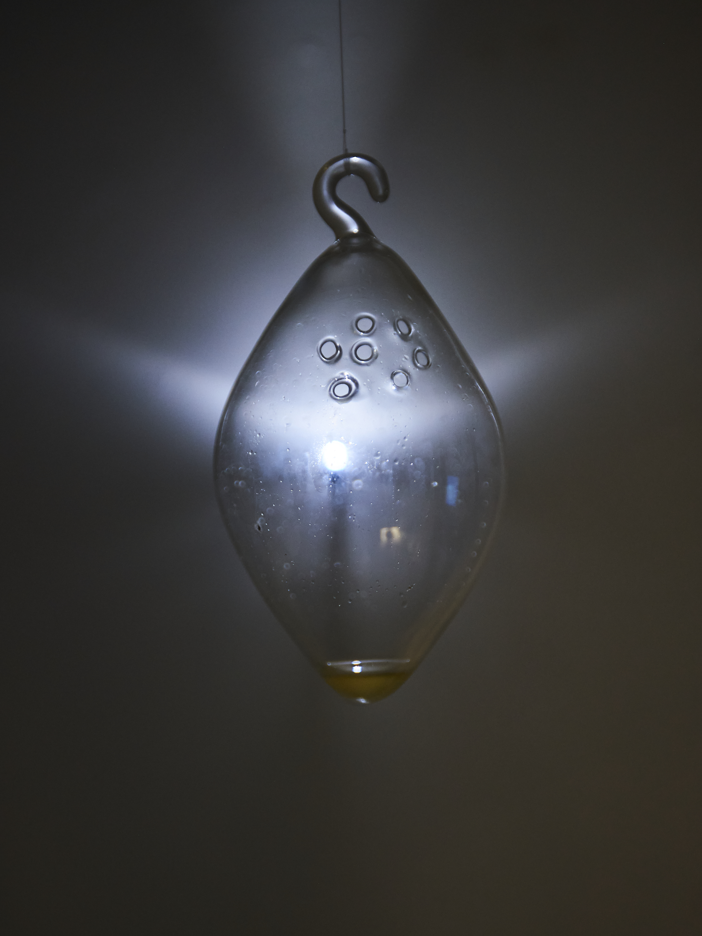 Love is Blind, hand-blown glass pendant enclosing an artist-created scent, dark macro detail